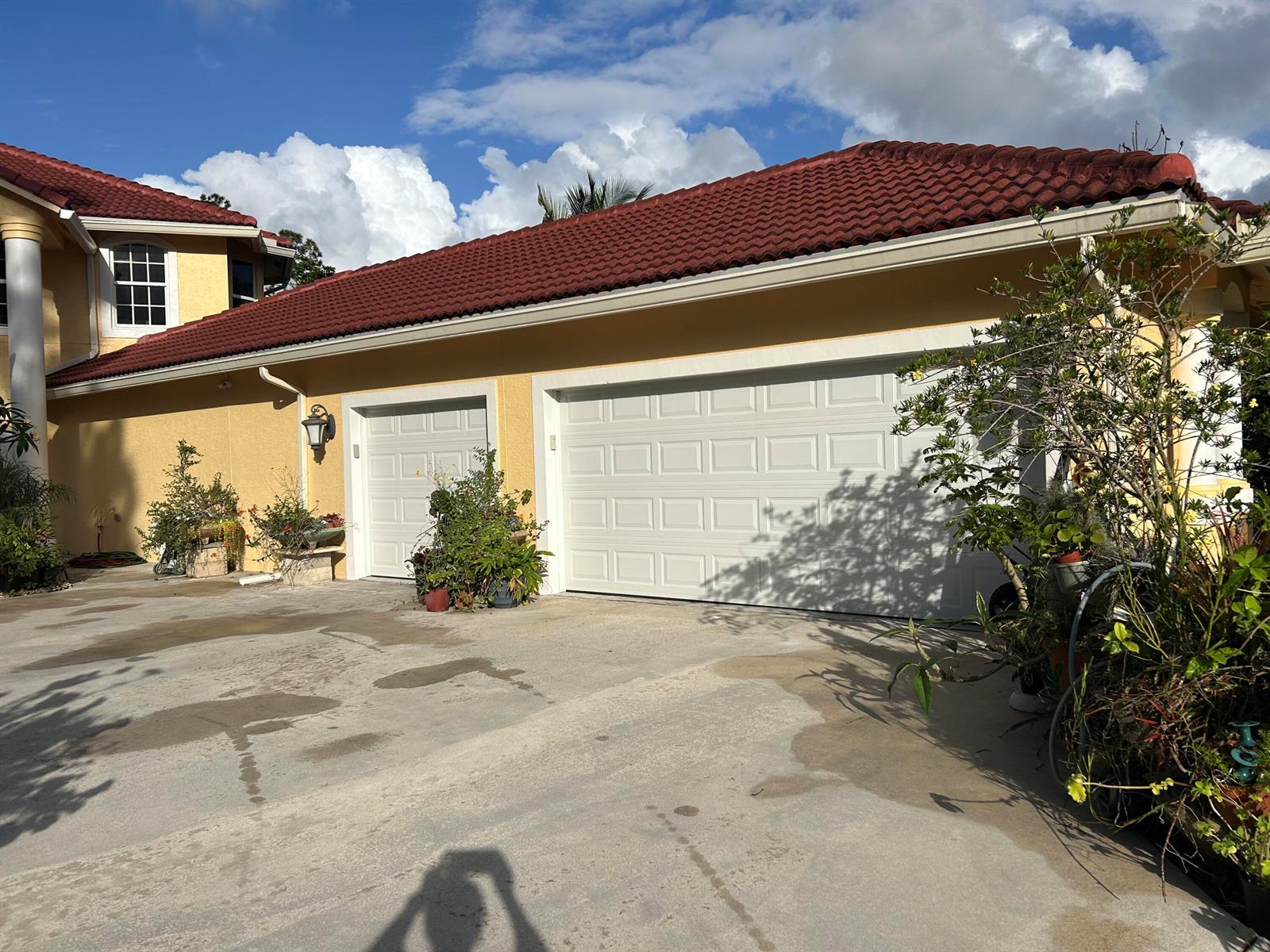 A yellow house with a red tile roof and a two-car garage — 6220 Kelty Way, Lake Worth FL 33467, LAKE WORTH, FL
