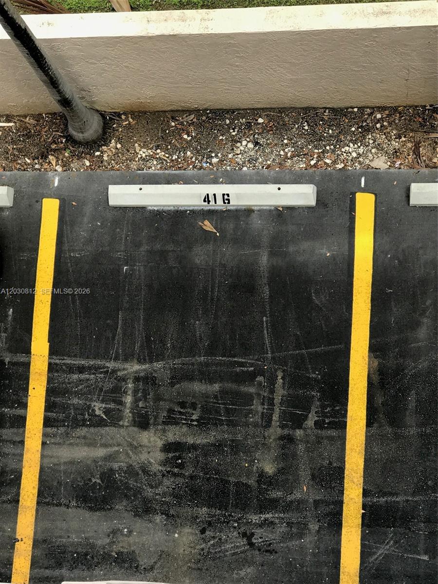 A parking space marked 41 G is shown with yellow painted lines on asphalt — 1665 Bay Rd # 416, Miami Beach FL 33139, MIAMI BEACH, FL