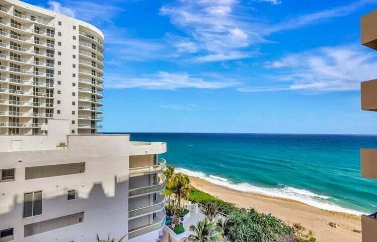An elevated view of a beach, ocean, and adjacent high-rise apartment buildings — 4200 N Ocean Drive # 905, Riviera Beach FL 33404, RIVIERA BEACH, FL
