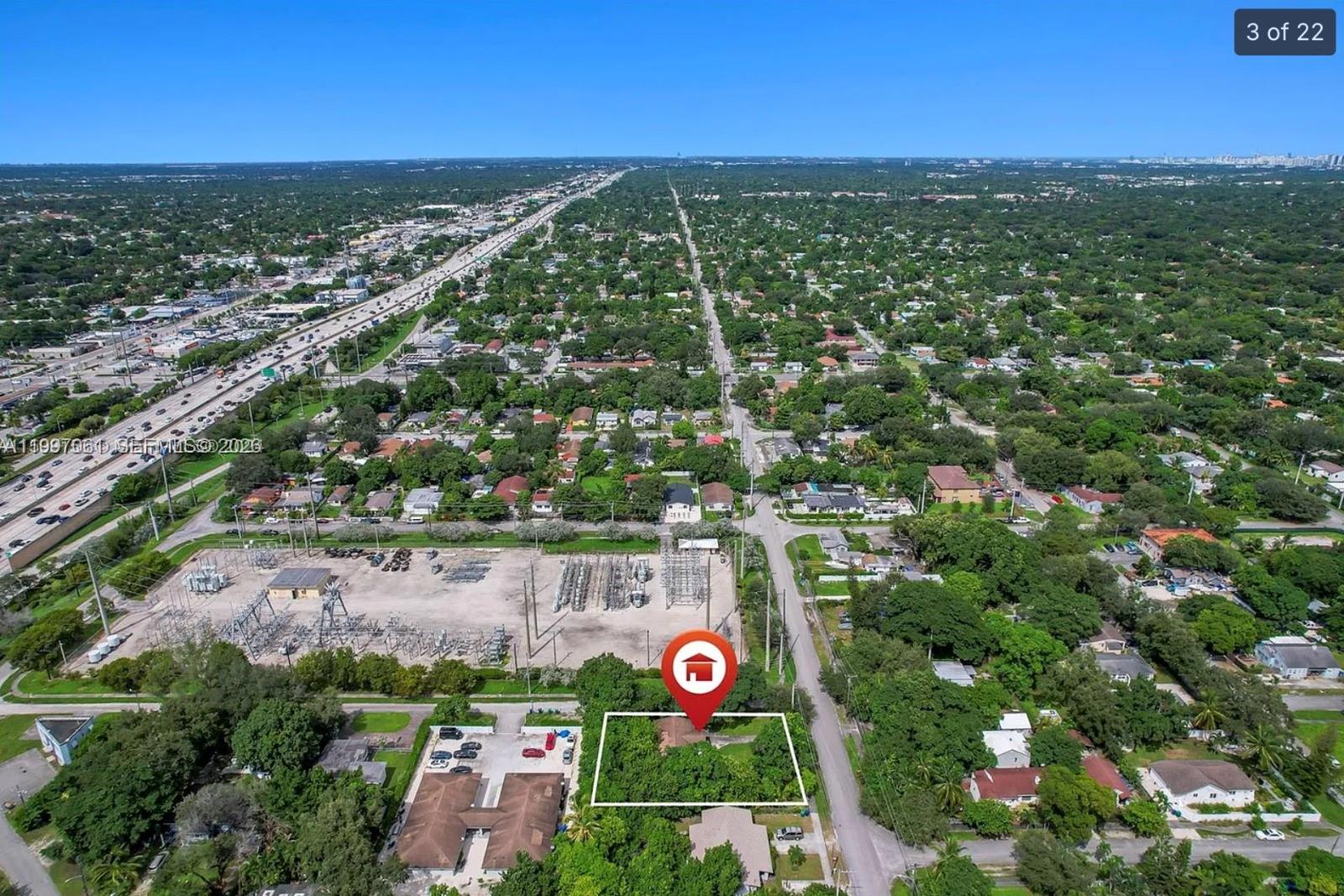An aerial view shows a rectangular lot with a house surrounded by dense trees — 9156 NW 5th Ave, Miami FL 33150, MIAMI, FL