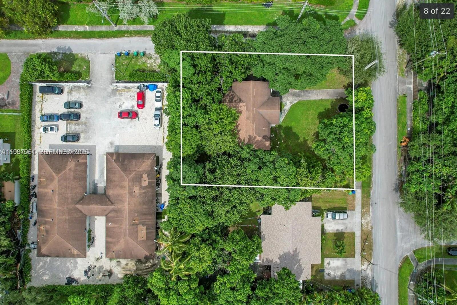 An aerial view shows a house surrounded by trees on a rectangular lot — 9156 NW 5th Ave, Miami FL 33150, MIAMI, FL
