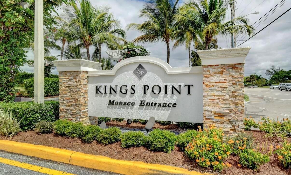 A stone and stucco monument sign marks the Monaco entrance to Kings Point — 581 Monaco Boulevard # 581, Delray Beach FL 33446, DELRAY BEACH, FL