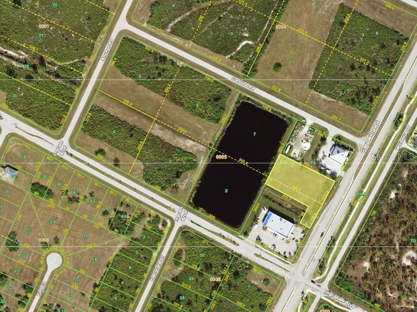 This is an aerial map showing a large pond and surrounding land parcels — 8395 GASPARILLA ROAD, PORT CHARLOTTE, FL