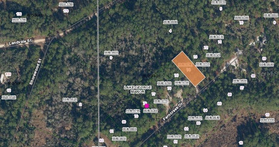 This is a map showing a highlighted parcel of land in a wooded area — 158 FERNCREEK DRIVE, GEORGETOWN, FL