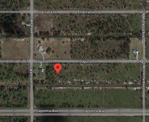 This is a satellite map view of a vacant lot marked with a red pin — 519 LAGUNA DRIVE, INDIAN LAKE ESTATES, FL