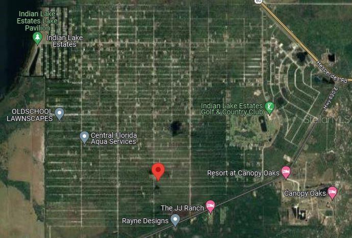 This is a satellite map view of a wooded area near Indian Lake Estates — 519 LAGUNA DRIVE, INDIAN LAKE ESTATES, FL