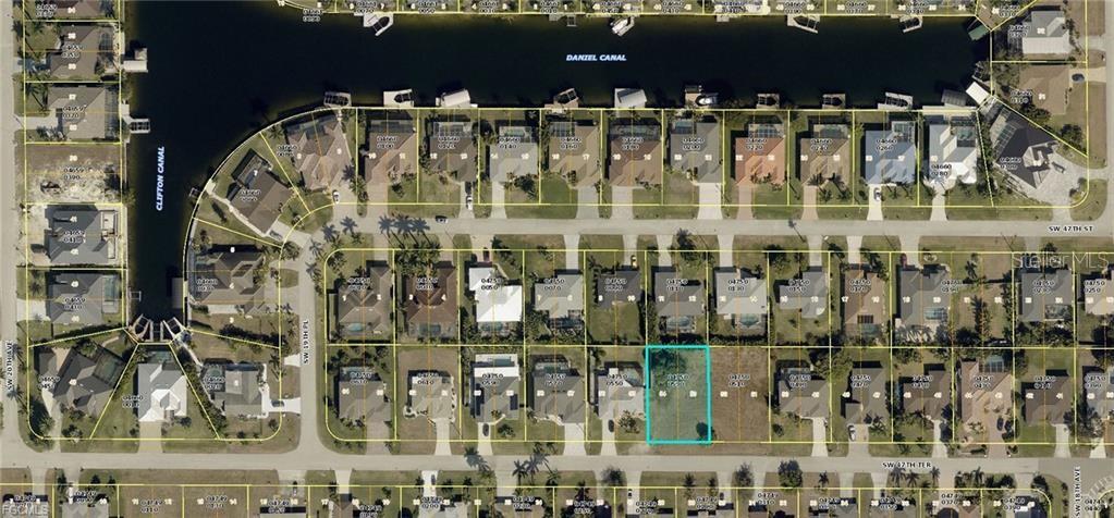 This is an aerial map showing a vacant residential lot highlighted in a suburban neighborhood — 1825 SW 47TH TERRACE, CAPE CORAL, FL