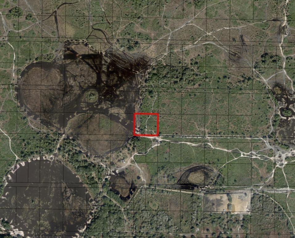 This is an aerial map showing a red square highlighting a specific parcel of land — 0 NW 304th Street, Okeechobee FL 34972, OKEECHOBEE, FL