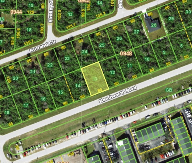 This is an aerial map showing a highlighted vacant lot located along Kenilworth Boulevard — 19876 KENILWORTH BOULEVARD, PORT CHARLOTTE, FL