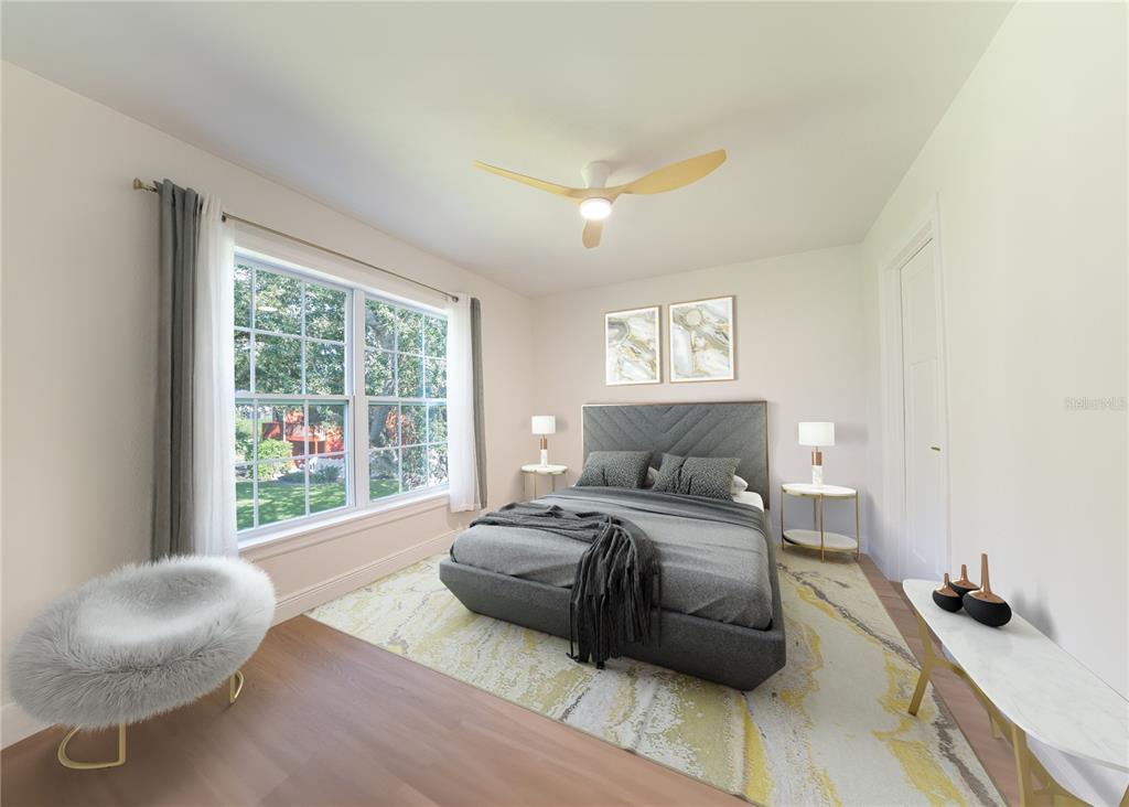 This is a digital rendering of a bedroom featuring a gray bed, area rug, and windows — 8210 12TH WAY N UNIT G, ST PETERSBURG, FL