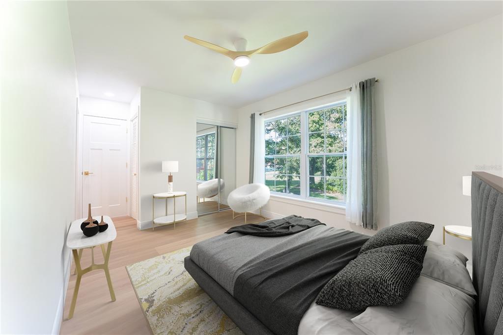 This is a digital rendering of a bedroom featuring a bed, window, and ceiling fan — 8210 12TH WAY N UNIT G, ST PETERSBURG, FL